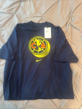 Nike Club América Women's Cotton Boxy Soccer T-Shirt in navy blue.